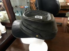 A leather kepi hat