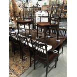 A mahogany dining table and 8 chairs