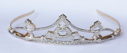 A diamond tiara set in 18ct gold contains Pave set round brilliant cut diamonds of fine quality.