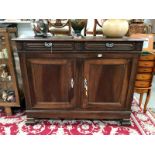 A teak 2 door 2 drawer buffet