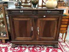 A teak 2 door 2 drawer buffet