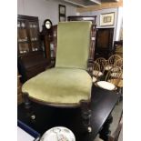 A Victorian mahogany framed nursing chair