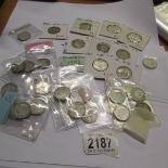 A quantity of UK silver coins.