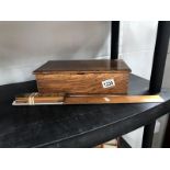 An oak box and rules