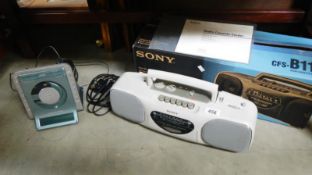 A boxed Sony CFS-B11L radio cassette recorder player and a CD player
