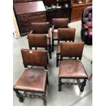 A set of 6 1930's oak chairs with leather seats,