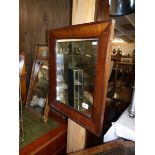 An Edwardian mahogany framed mirror, approximately 54 x 47 cm.