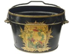 An old black painted bucket with oriental scene,.