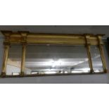 An antique paladium style triple giltwood framed mirror, approximately 56 x 140 cm,