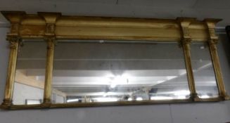 An antique paladium style triple giltwood framed mirror, approximately 56 x 140 cm,
