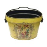 An old yellow painted bucket with oriental scene.