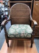 An armchair with bergere back