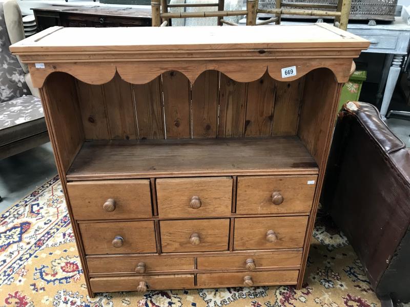 A pine 10 drawer storage unit
