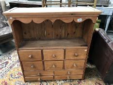 A pine 10 drawer storage unit