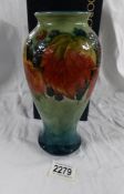 A Moorcroft mid 20th century leaf and blackberry vase, boxed.