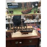 A cased model sailing ship of the 1760 English Frigate President by Sergal models with original box