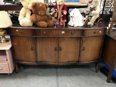 An Edwardian mahogany sideboard