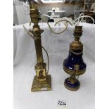 A brass Corinthian column table lamp base and one other.