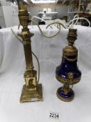 A brass Corinthian column table lamp base and one other.