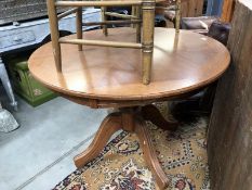 A modern oak round dining table