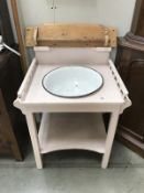 A painted pine washstand with enamel bowl