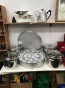 A quantity of catering stainless steel pans including 24 place poached egg pan