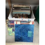 A collection of records including Beatles, Sex Pistols, Def Leppard etc.