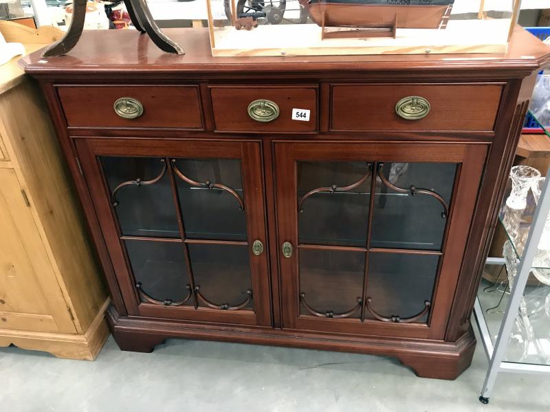 A mahogany astragal glazed cabinet