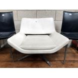 A B & B Italia Metropolitan cream leather arm chair by Jeffrey Bernett.