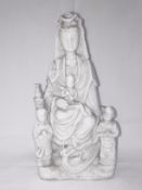A 19th century Chinese blanc de chine figure of Buddha with children, a/f.