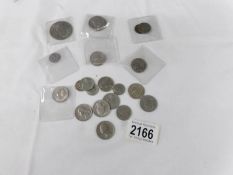 A mixed lot of USA coinage including some 19th century and a 1971 'Liberty' dollar.