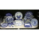 A shelf of blue and white pottery