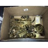 A box containing brass catches etc.