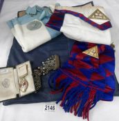 A collection of Masonic regalia including sash,