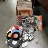 A quantity of LP records and 45rpm records etc.