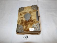An old French photo album with silver details with early French photographs (some in military