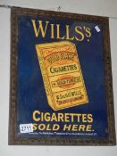 A retro Will's cigarettes advertising sign in old frame.