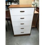 A teak effect bedroom chest of drawers