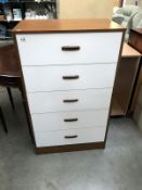 A teak effect bedroom chest of drawers