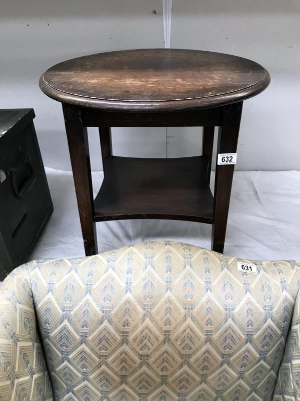 A small 1930's round oak side table