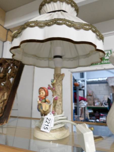 A Goebel table lamp complete with shade,.