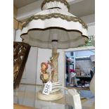 A Goebel table lamp complete with shade,.