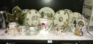 A quantity of continental porcelain plates and figures