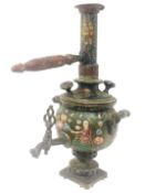 A very early hand painted oriental urn with tap.