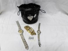 3 designer watches being Guess by Marciano, Swatch and Giorgio Daneili.