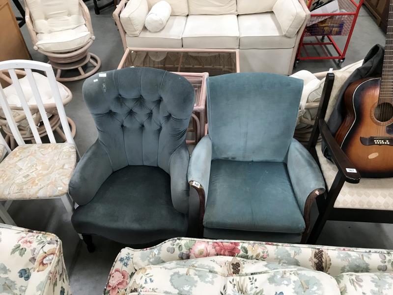 A blue fabric deep button arm chair and 1 other