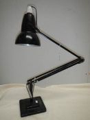 A vintage angle poise lamp.