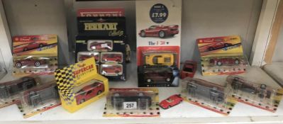 A quantity of Diecast Ferraris some boxed including a yellow one