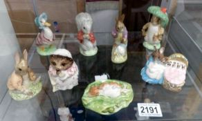 A collection of Beatrix Potter figures - 4 Royal Albert, 2 Royal Doulton and 2 Beswick (8 in total).