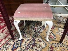 A dressing table stool with Queen Anne legs
